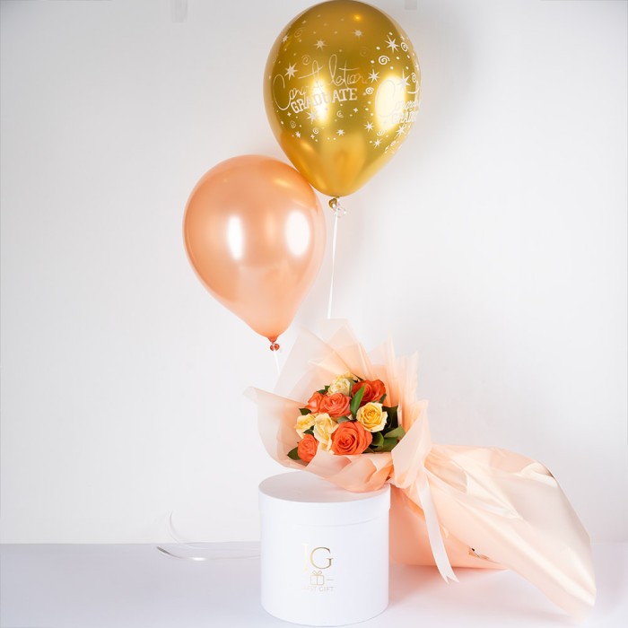 orange roses graduation hand bouquet