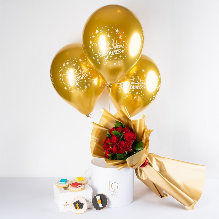 red roses and graduation cookies